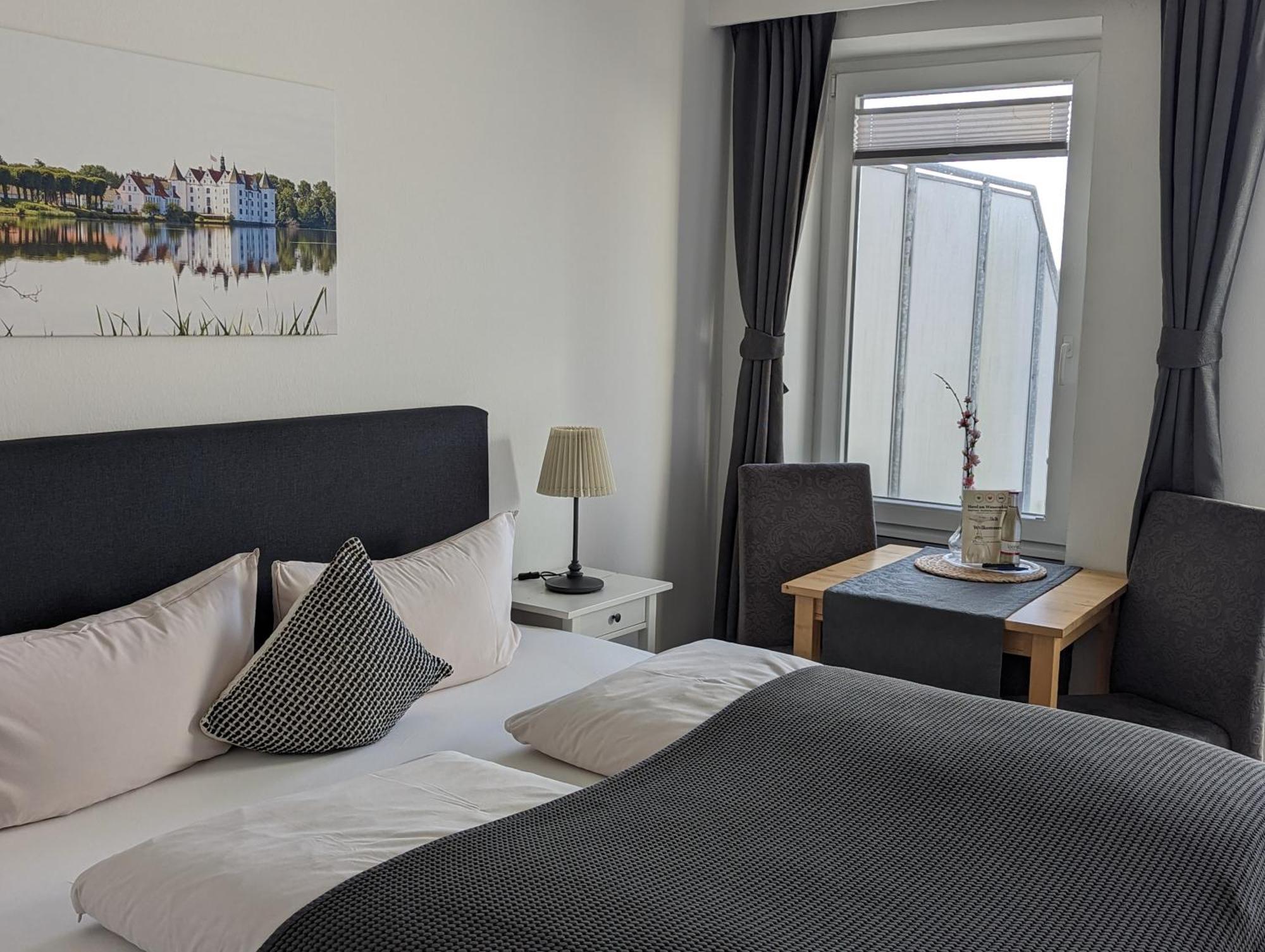 Hotel Am Wasserschloss Glücksburg Extérieur photo